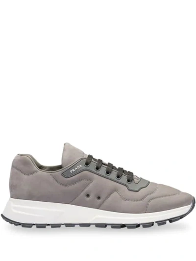 Prada Logo-appliquéd Sneakers In Grey