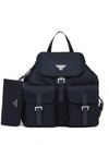 Prada Logo Plaque Backpack In Blue