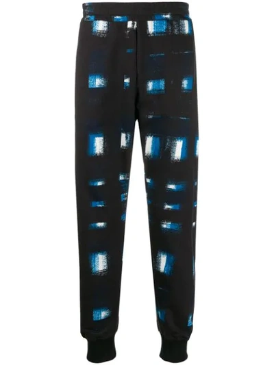 Alexander Mcqueen Printed Tapered Track Trousers In Blue