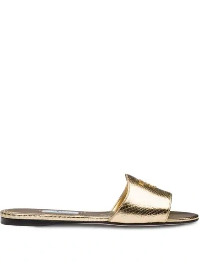 Prada Ayers Leather Slides In Gold