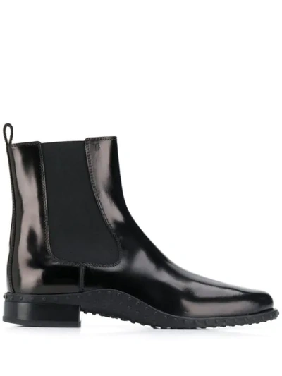 Tod's Pebbled Sole Ankle Boots In Black