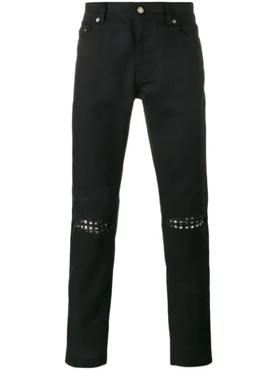 Saint Laurent Distressed Skinny-fit Jeans In Black