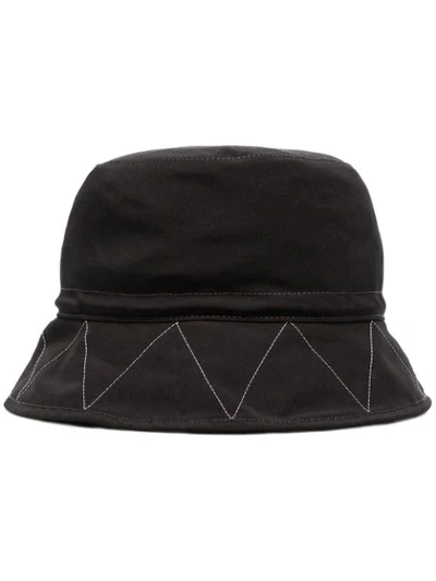 And Wander Logo Embroidered Bucket Hat In Black