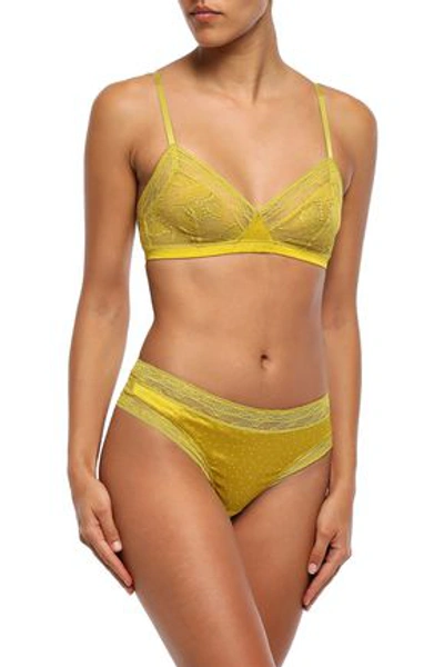 Eres Farniente Oisiveté Swiss-dot Satin And Leavers Lace Mid-rise Thong In Mustard