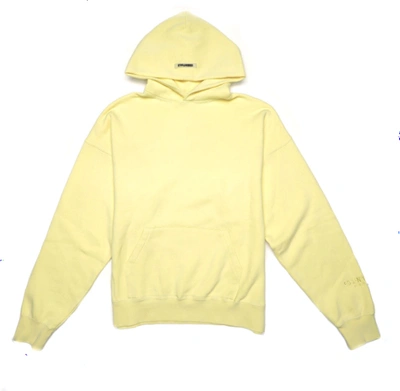 Fear of god essentials yellow hoodie sales