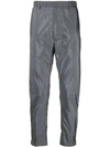 Prada Technical Fabric Trousers In Grey