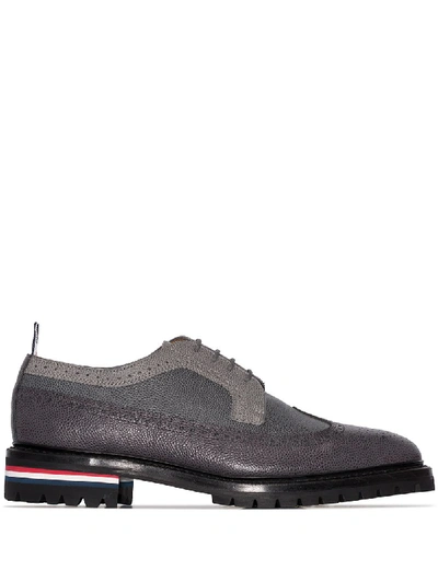 Thom Browne Panelled Pebble-grain Leather Longwing Brogues In Grey