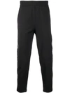 Moschino Logo Trim Track Pants In Black