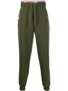 Moschino Logo Tape Track Trousers In Green