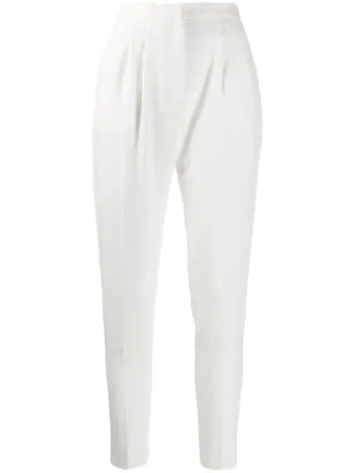 Loulou Pleated Tapered-leg Trousers In White