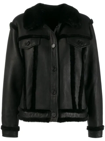 Sandro Collared Shearling Leather Jacket In Black
