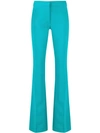 Moschino Flared Mid-rise Trousers In Green