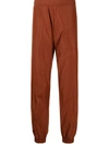 A-cold-wall* Overlock Logo-print Track Pants In Orange