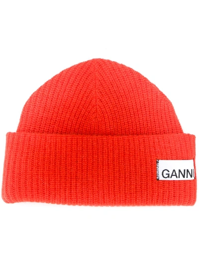 Ganni Stitched-logo Ribbed Wool-blend Beanie In Orange