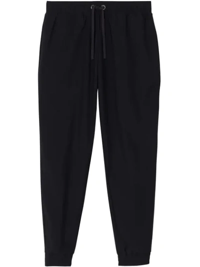 Burberry Logo Print Cotton Trackpants In Black