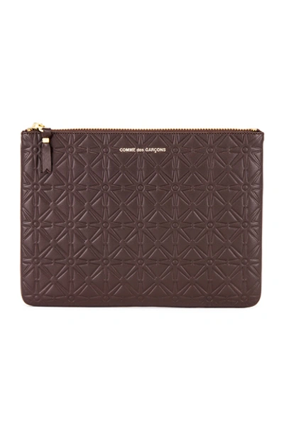 Comme Des Garçons Star Embossed Pouch In Brown