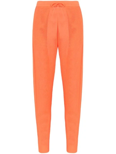 Adam Selman Sport Mid-rise Mesh Track Trousers In Orange