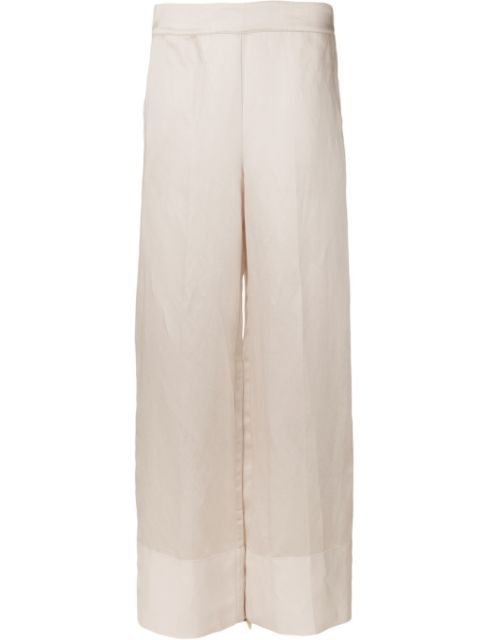 cream flared trousers