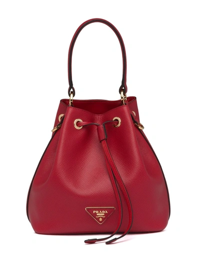 Prada Triangle Patch Bucket Bag In Red