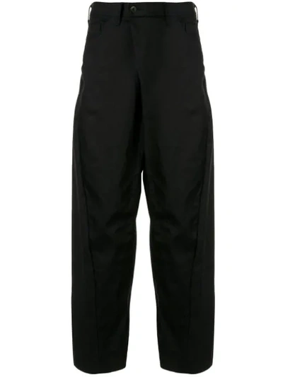 Julius Curved Wide Leg Trousers In Black