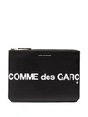 Comme Des Garçons Printed Logo Purse In Black