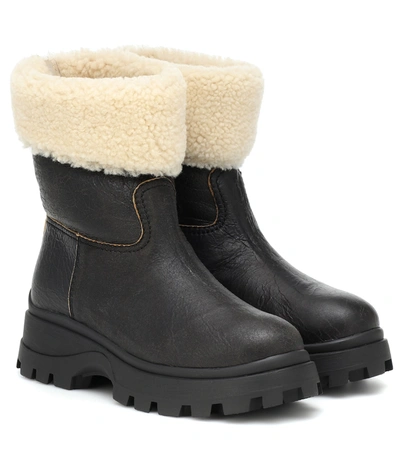 Miu Miu Shearling-lined Cracked-leather Ankle Boots In Black