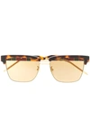 Gucci Tortoiseshell Effect Sunglasses In Gold