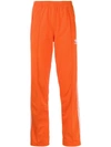 Adidas Originals Logo Printed Track Pants In Orange