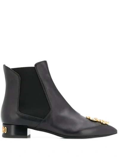 Moschino Dollar Sign Plaque Ankle Boots In Black