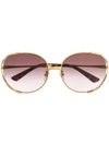 Gucci Striped Frame Sunglasses In Gold