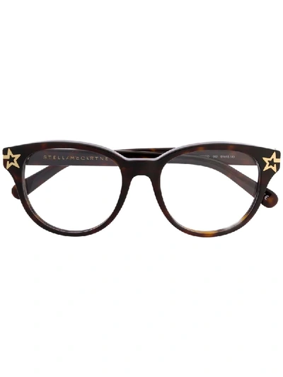 Stella Mccartney Star Detail Round-frame Prescription Glasses In Black Black Transparent