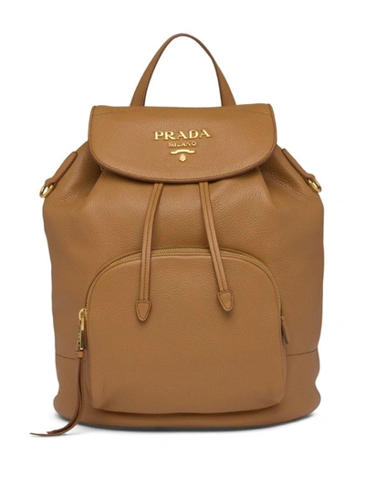 Prada Pebbled Leather Logo Backpack In Brown