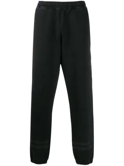 Stone Island Embroidered Track Pants In Black