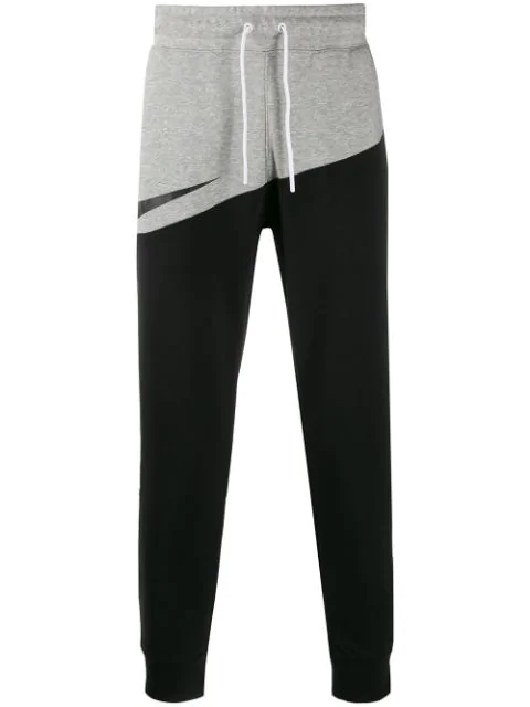 nike swoosh logo trousers