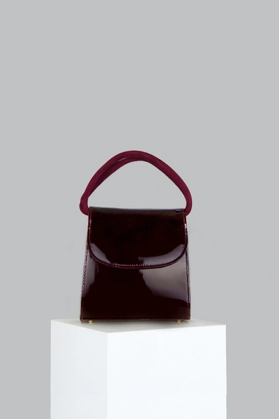 Folklore Loop Bag In Maroon Patent Leather In Purple