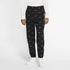 Nike Nrg Tapered Logo-embroidered Fleece-back Cotton-blend Jersey Sweatpants In Black