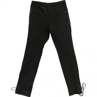 Pre-owned Lanvin Wool Trousers In Black