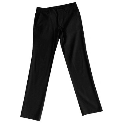 Pre-owned Theory Wool Trousers In Black