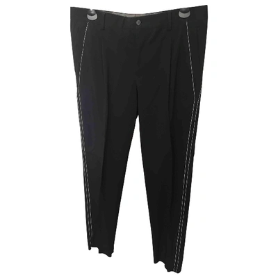 Pre-owned Emporio Armani Wool Trousers In Black