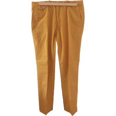 Pre-owned Carven Trousers In Orange