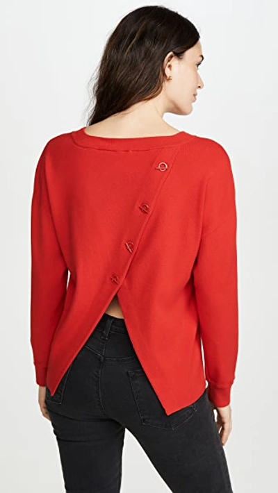 Alice And Olivia Ruela Split-back Sweater With Hardware Detail In Paprika