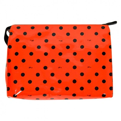 Pre-owned Genny Patent Leather Clutch Bag In Orange