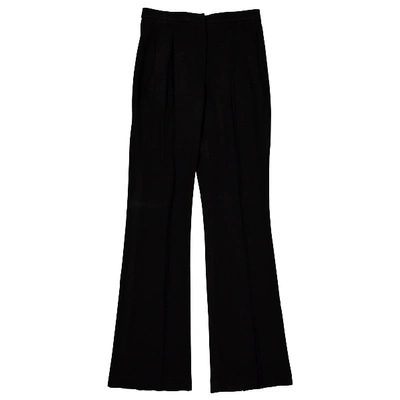 Pre-owned Donna Karan Wool Trousers In Black