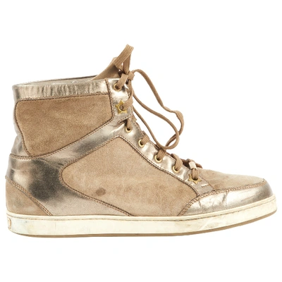 Pre-owned Jimmy Choo Trainers In Gold