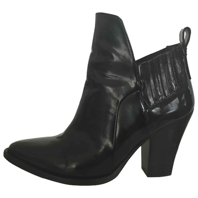 Pre-owned Maje Patent Leather Ankle Boots In Black