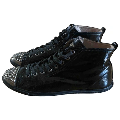 Pre-owned Miu Miu Patent Leather Trainers In Black