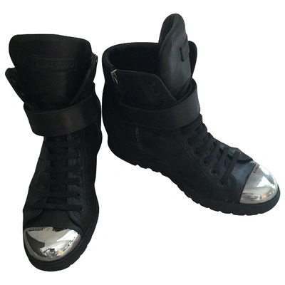 Pre-owned Miu Miu Leather Trainers In Black