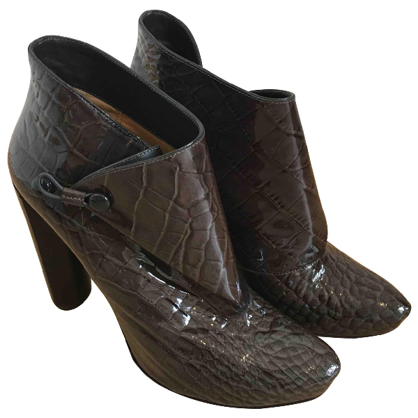 Pre-Owned Louis Vuitton Grey Patent Leather Ankle Boots | ModeSens
