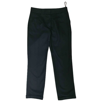 Pre-owned Carven Wool Trousers In Black