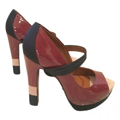 Pre-owned Schutz Patent Leather Heels In Burgundy